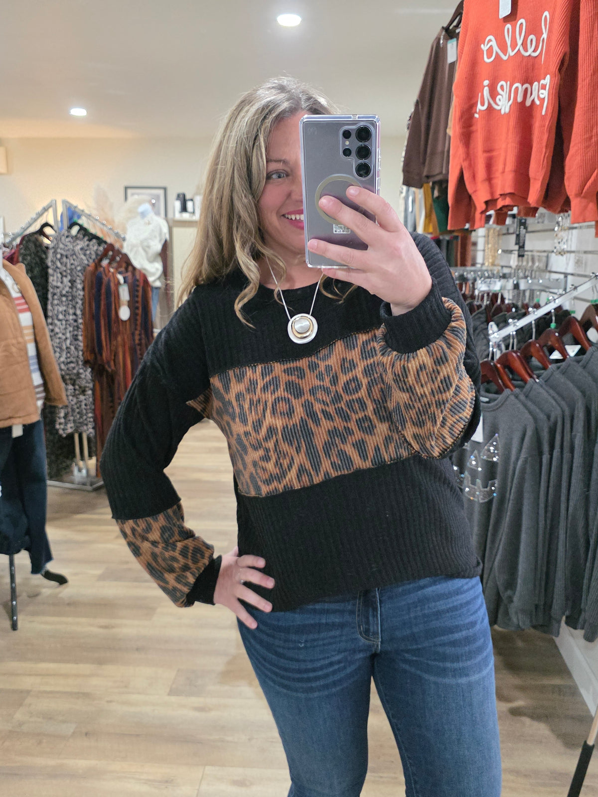 BLACK TEXTURED ANIMAL COLORBLOCK KNIT TOP