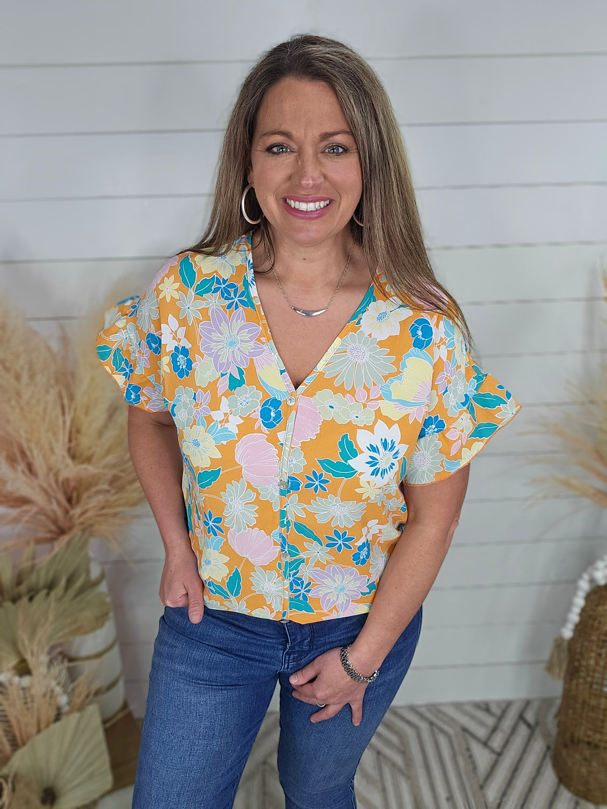 ORANGE FLORAL FAUX BUTTON FRONT V NECK TOP