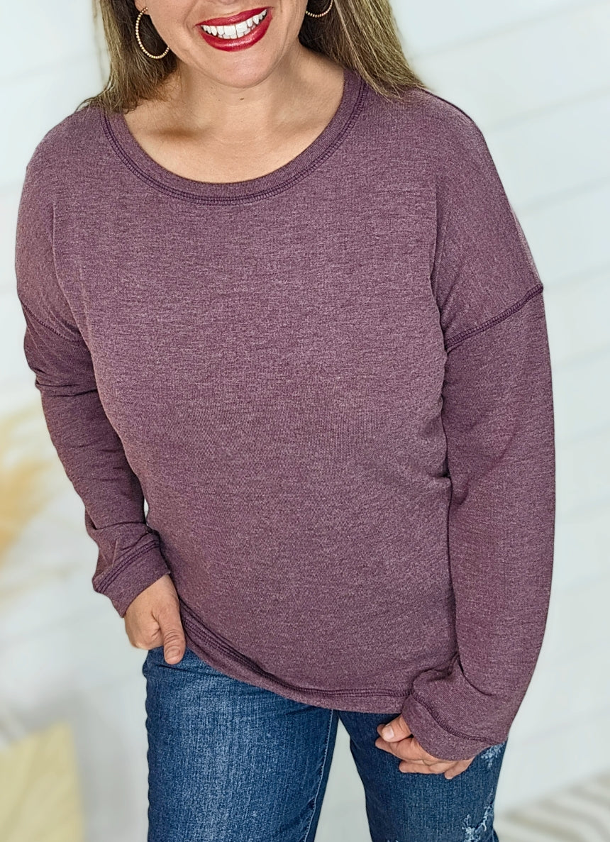 PLUM EXPOSED SEAM KNIT TOP