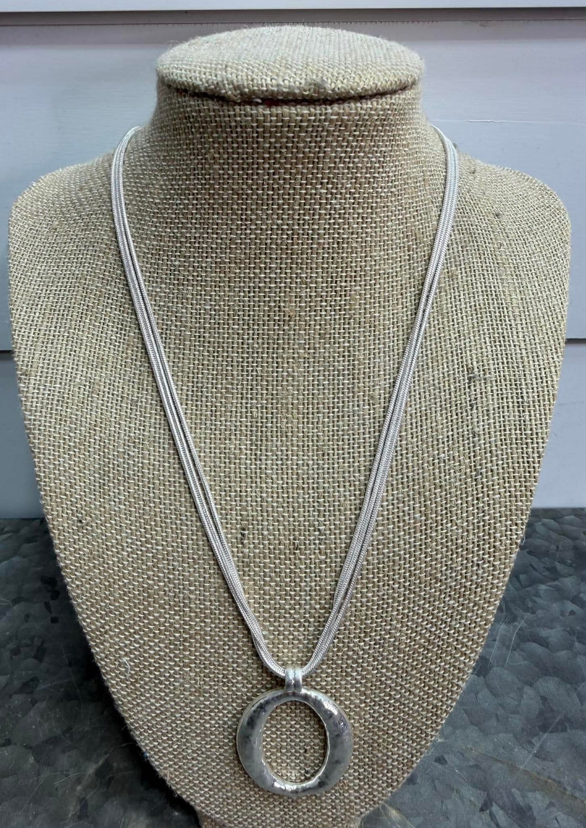 WORN SILVER CHAIN OVAL NECKLACE