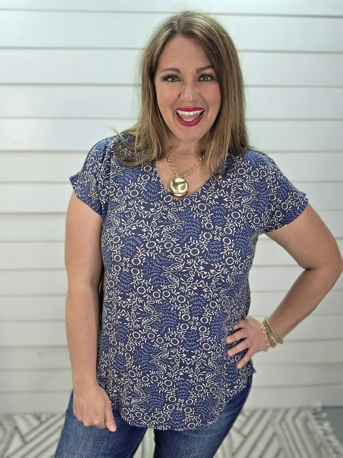 NAVY FLORAL V NECK WOVEN TOP
