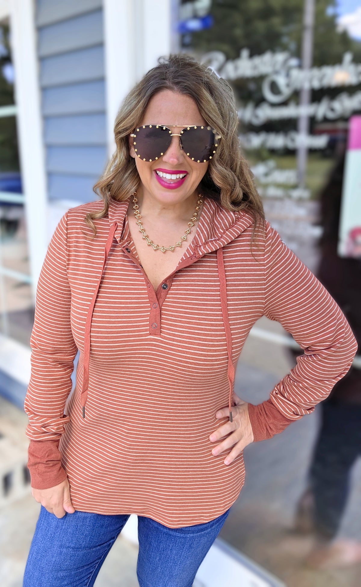 RUST STRIPED SNAP BUTTON HENLEY HOODED KNIT TOP