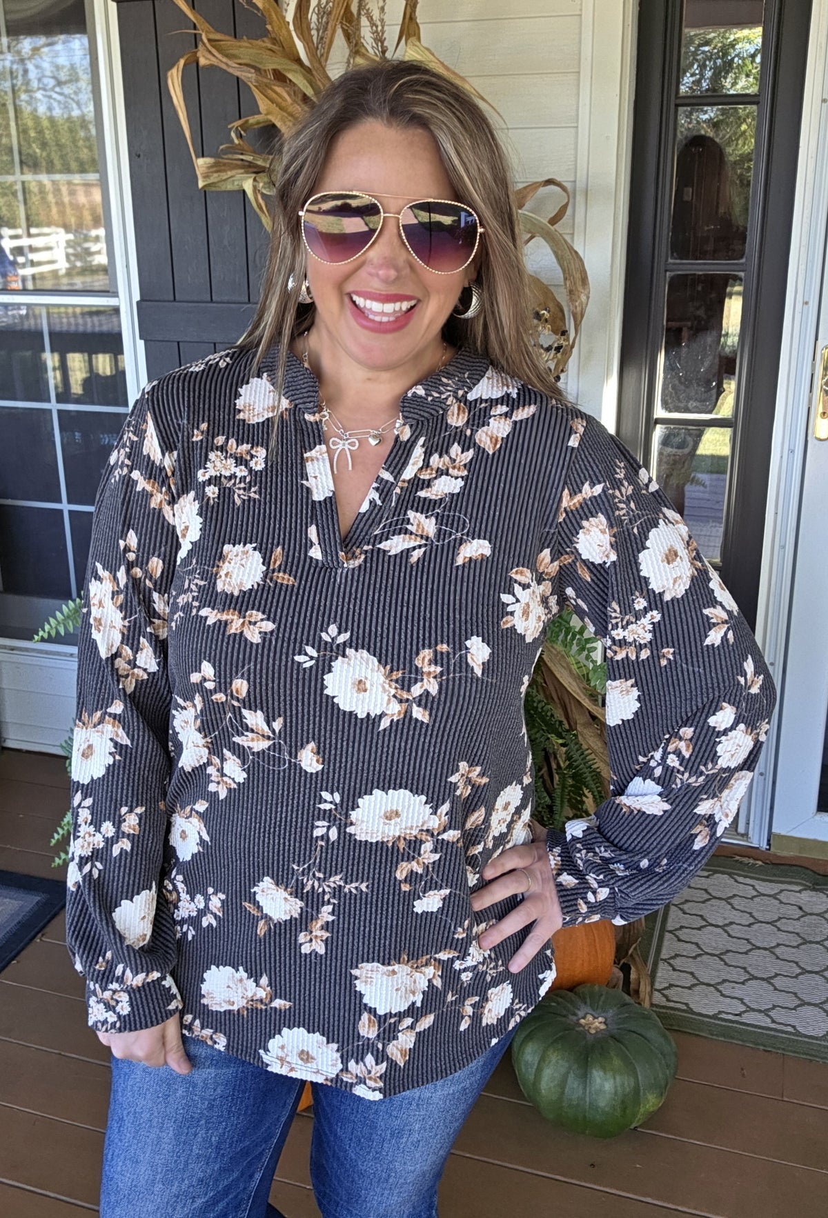 BLACK RAISED RIBBED FLORAL V NECK TOP