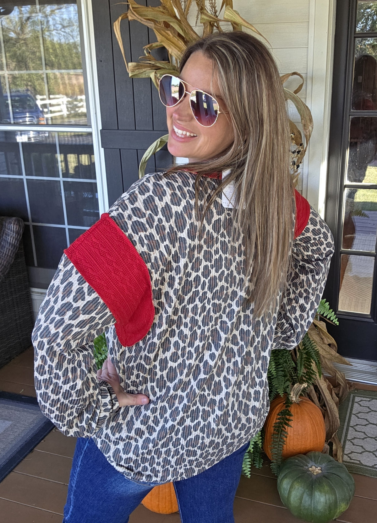 TAUPE ANIMAL PRINT RAISED RIBBED TOP WITH RED TRIM