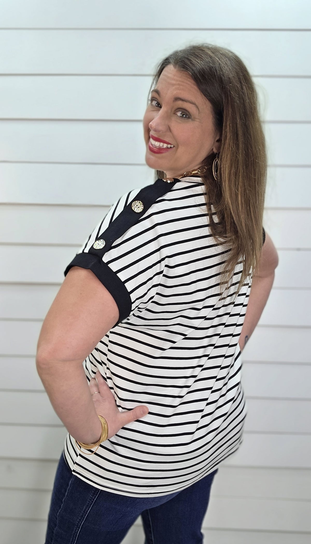 BLACK/WHITE STRIPED KNIT TOP W/ BUTTON SLEEVE DETAILS