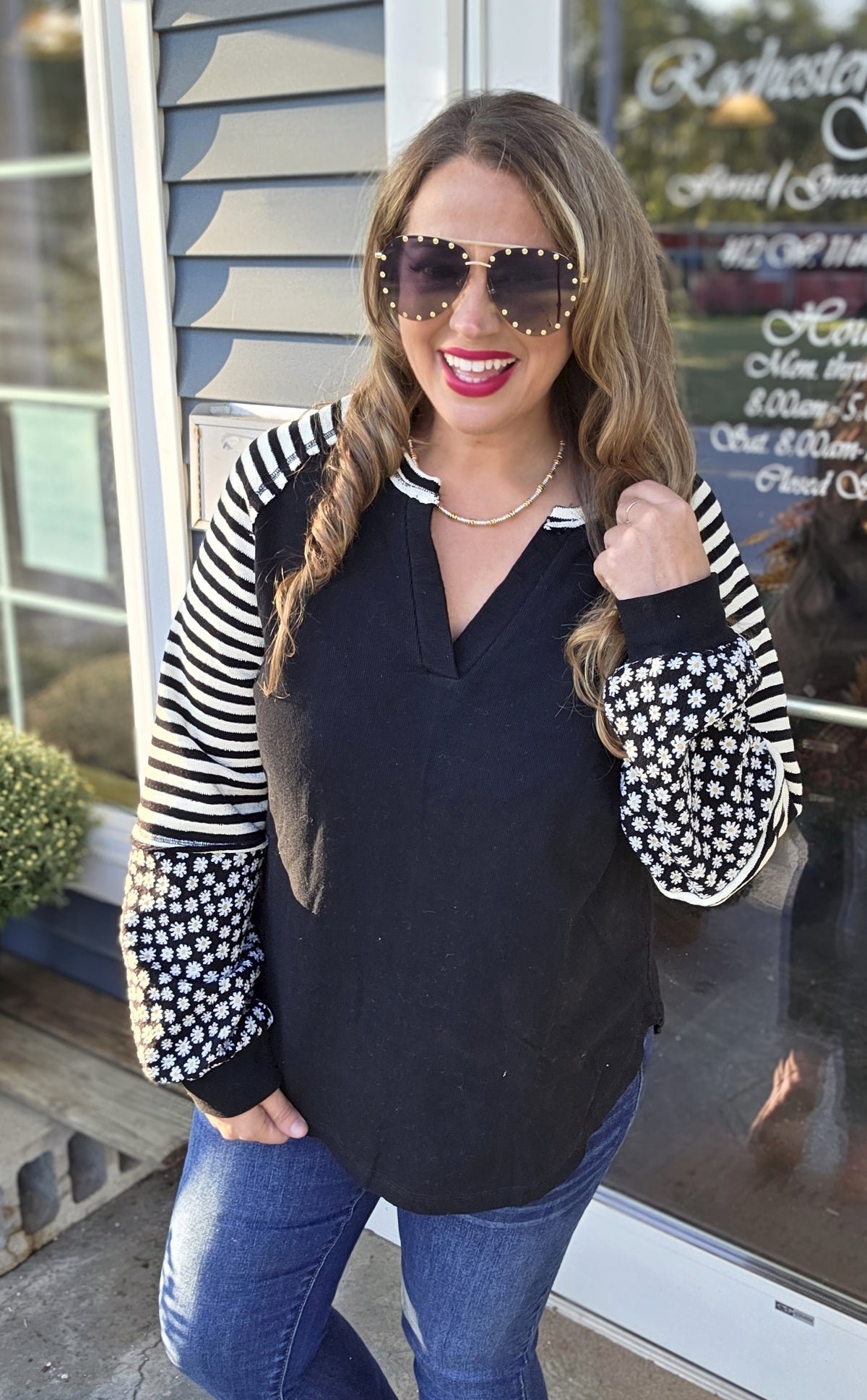 BLACK COTTON TOP W/ CONTRAST STRIPED AND FLORAL SLEEVES