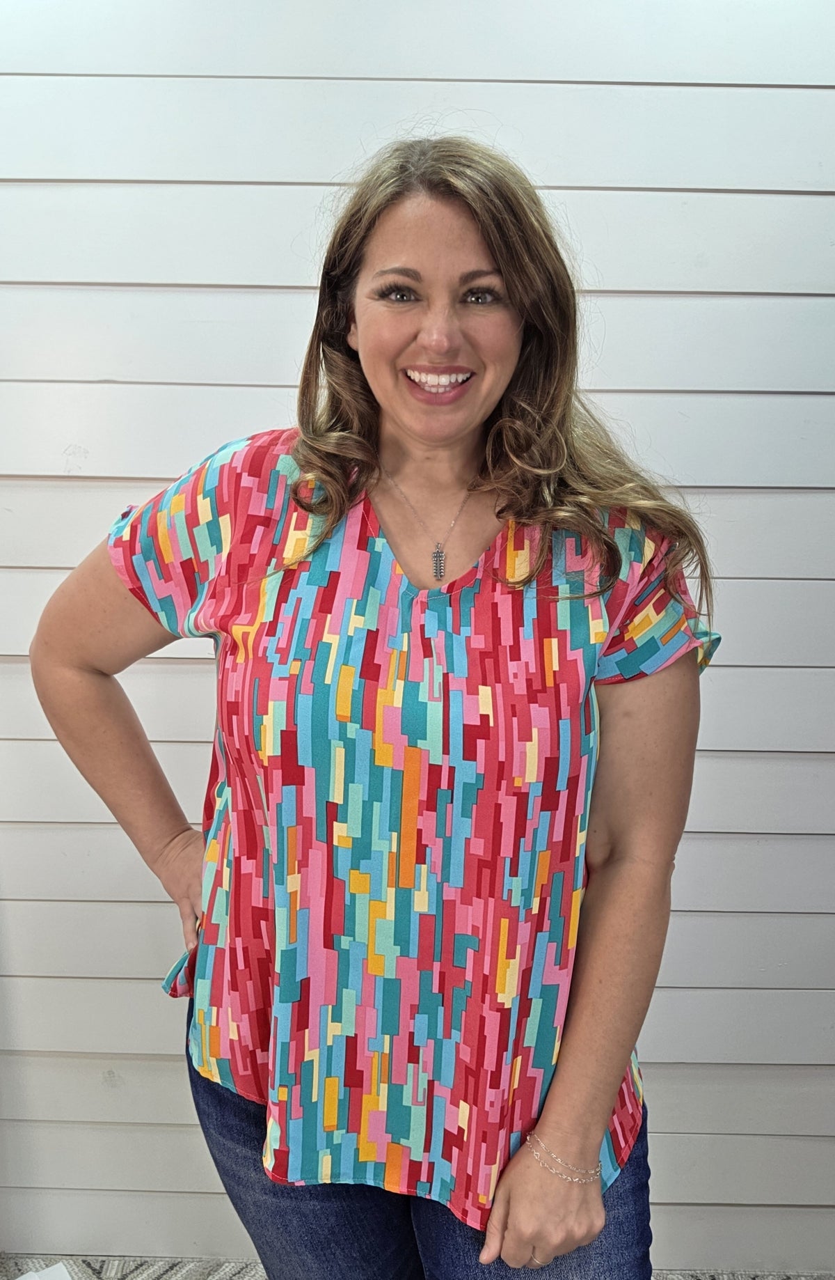 FUCSHIA/TEAL MULTI PRINT V NECK WOVEN TOP