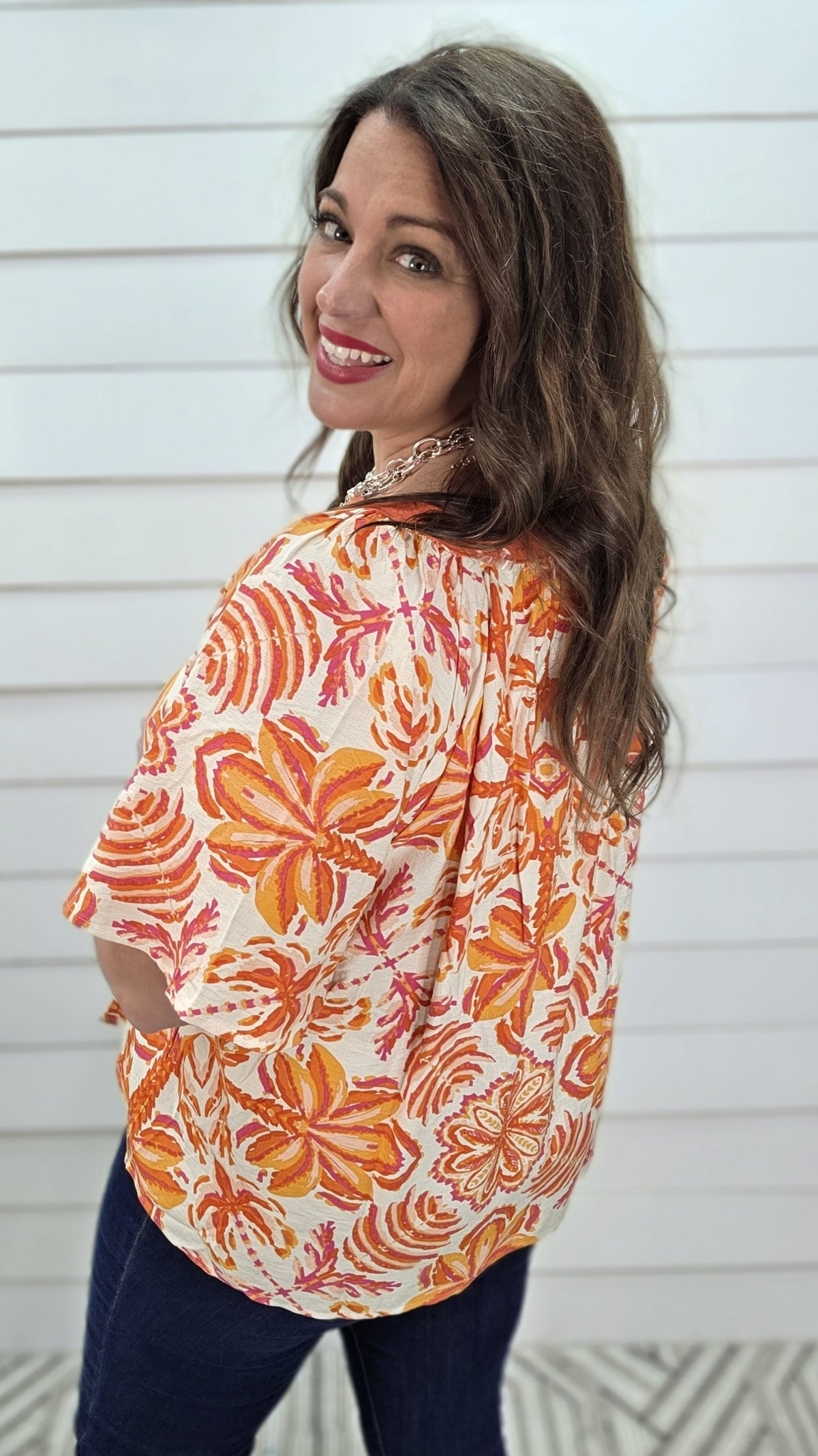 ORANGE FLORAL PRINT TOP W/ Y NECK LINE AND FLUTTER SLEEVE