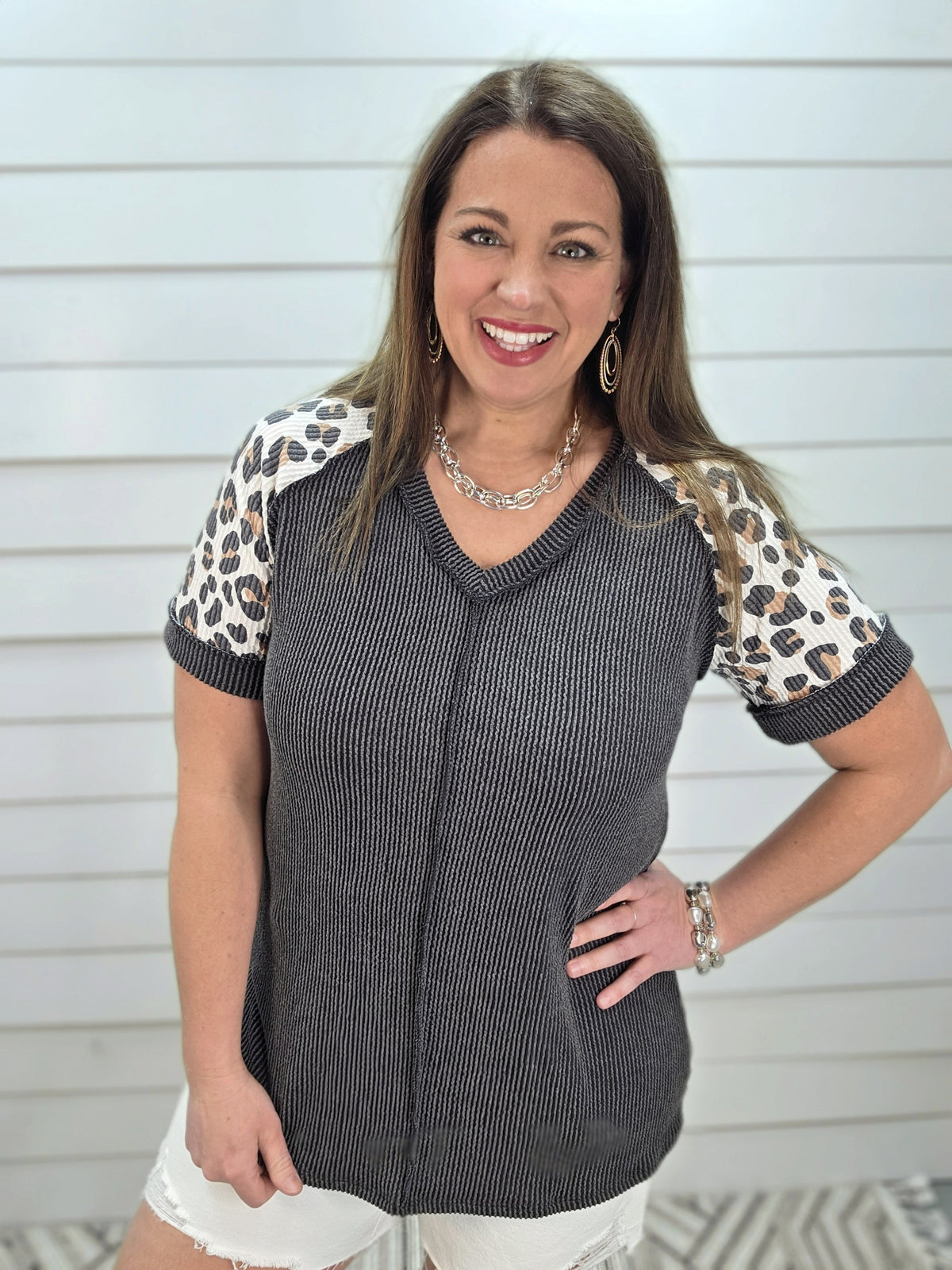 BLACK RAISED RIBBED KNIT TOP W/ LEOPARD SLEEVES AND CENTER SEAM