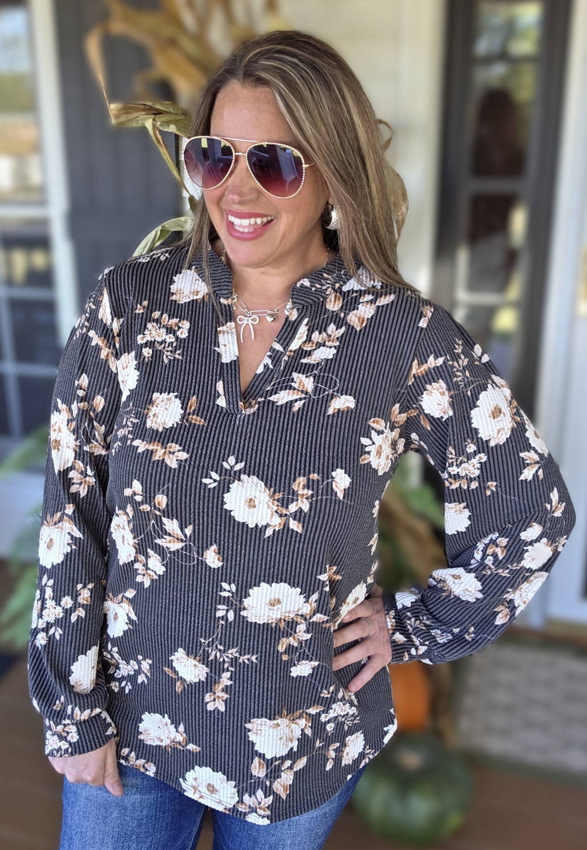 BLACK RAISED RIBBED FLORAL V NECK TOP