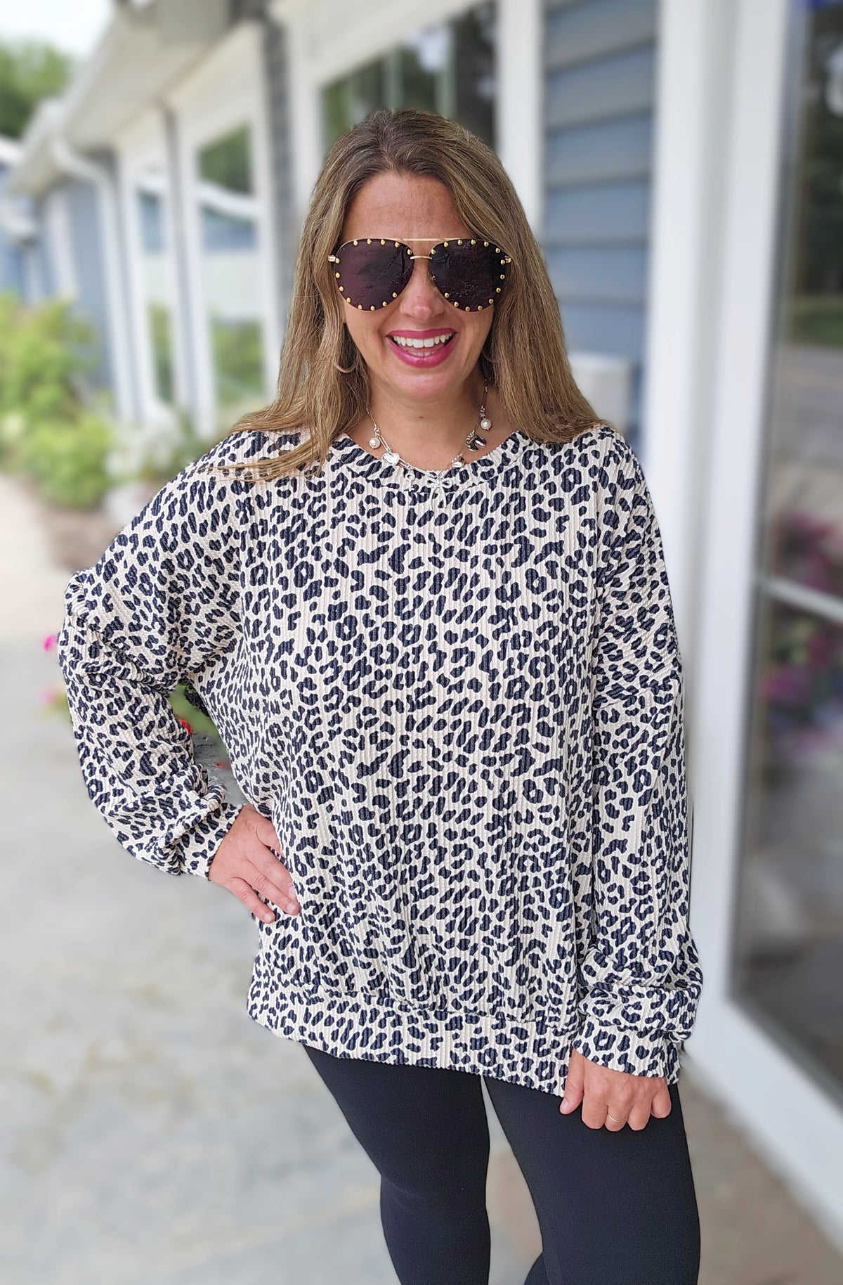 CREAM ANIMAL RAISED RIBBED SLIT BOTTOM LONG SLEEVE TOP