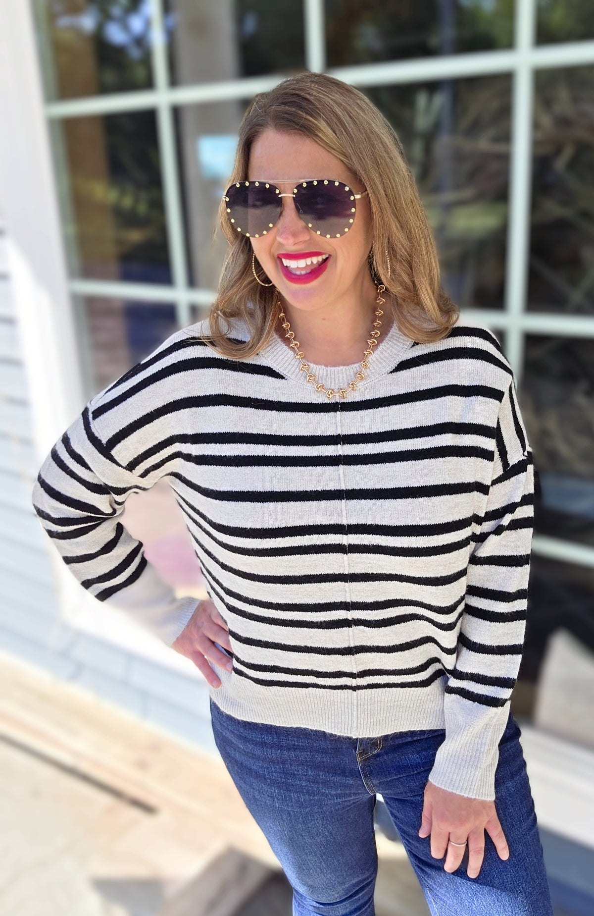CREAM/BLACK STRIPED KNIT SWEATER