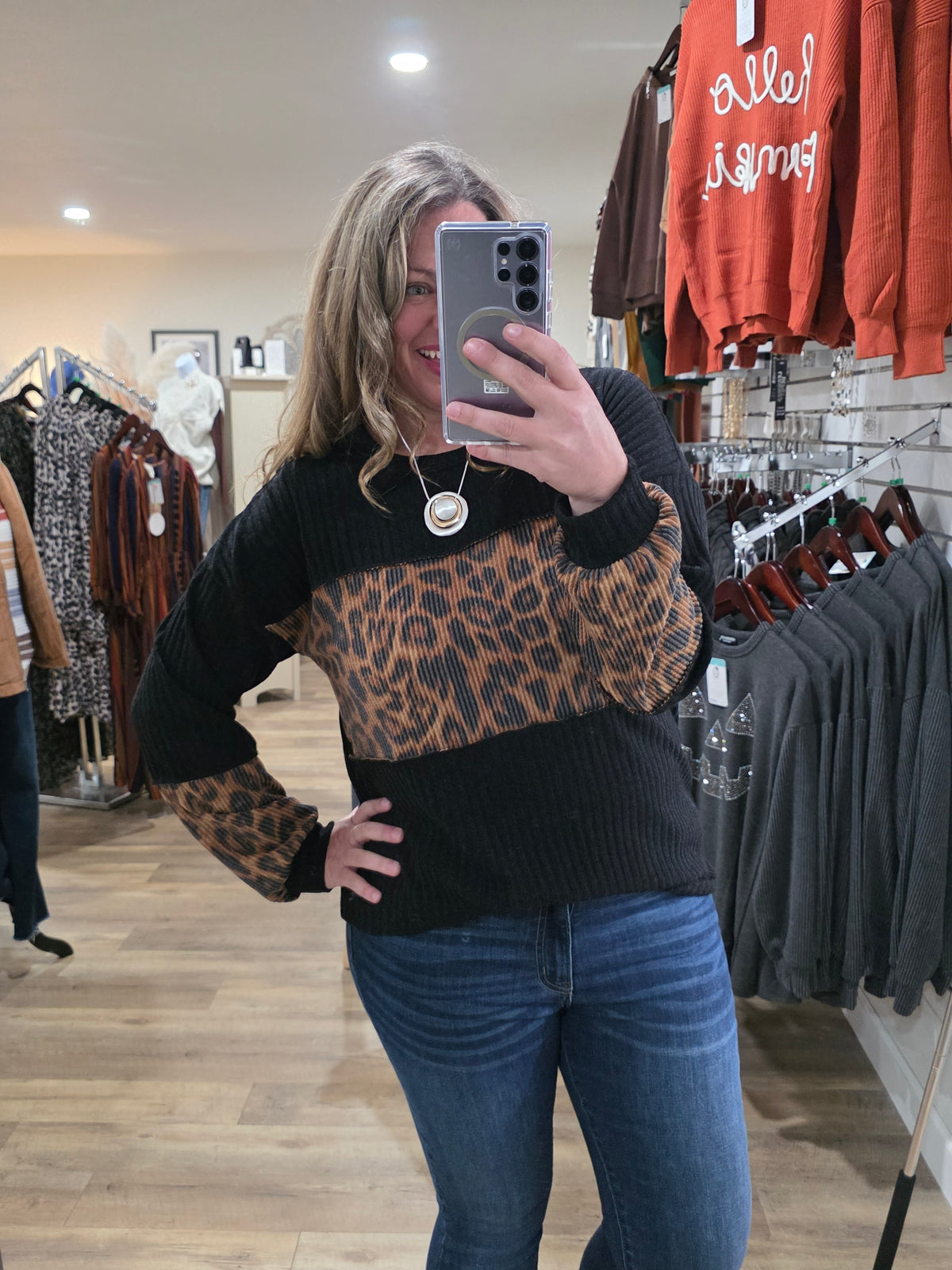 BLACK TEXTURED ANIMAL COLORBLOCK KNIT TOP