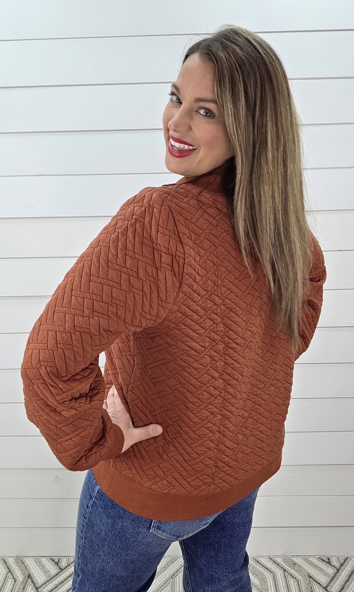RUST QUILTED QUARTER ZIP PULLOVER