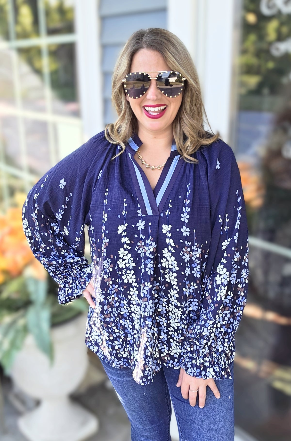 NAVY FLORAL V NECK WOVEN TOP