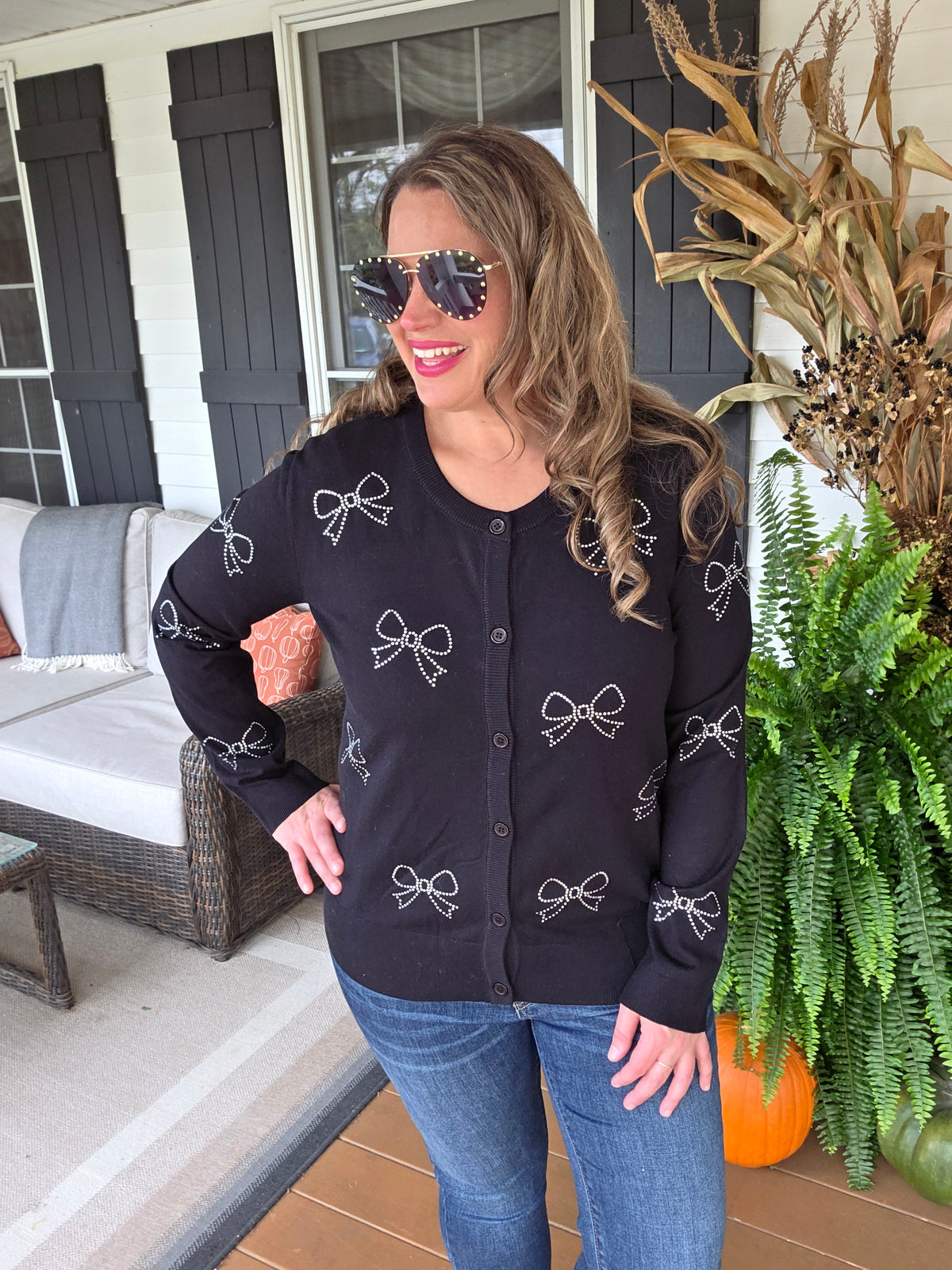 BLACK BOW RHINESTONE BUTTON SWEATER