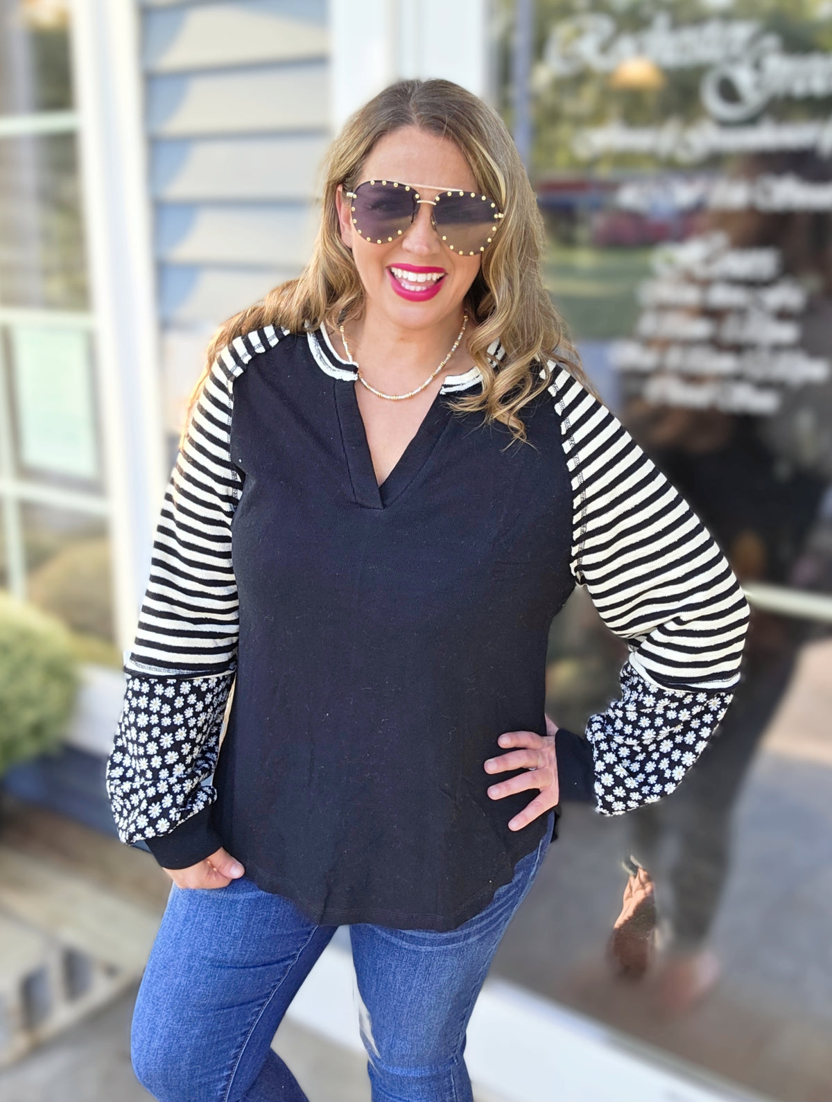 BLACK COTTON TOP W/ CONTRAST STRIPED AND FLORAL SLEEVES