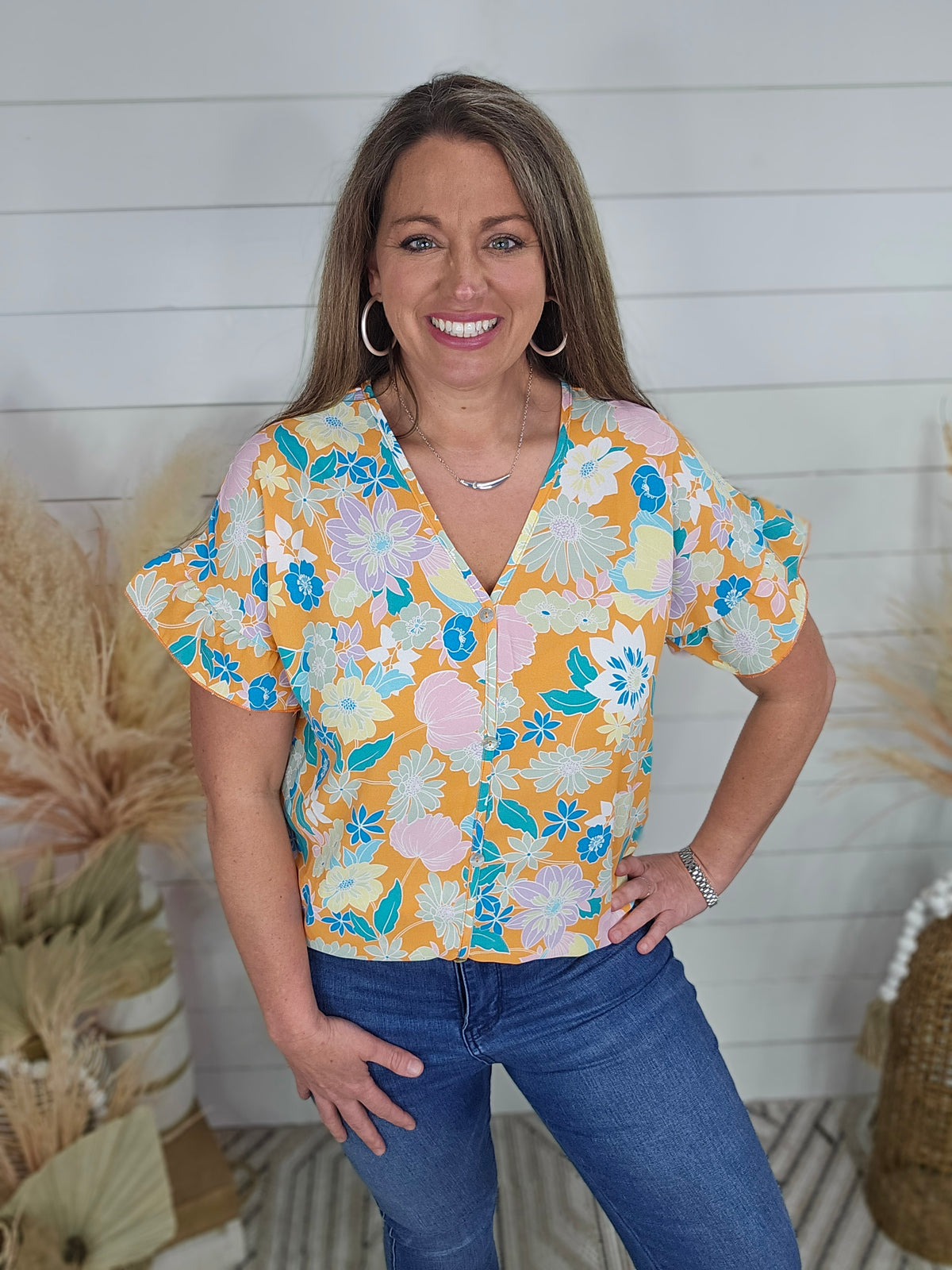 ORANGE FLORAL FAUX BUTTON FRONT V NECK TOP