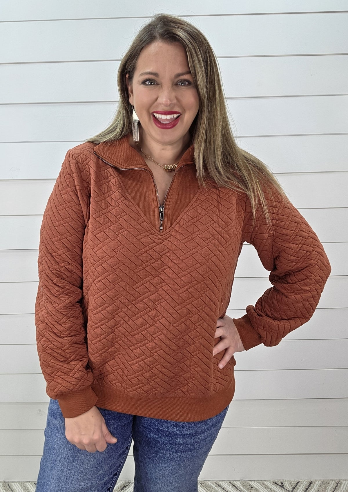 RUST QUILTED QUARTER ZIP PULLOVER