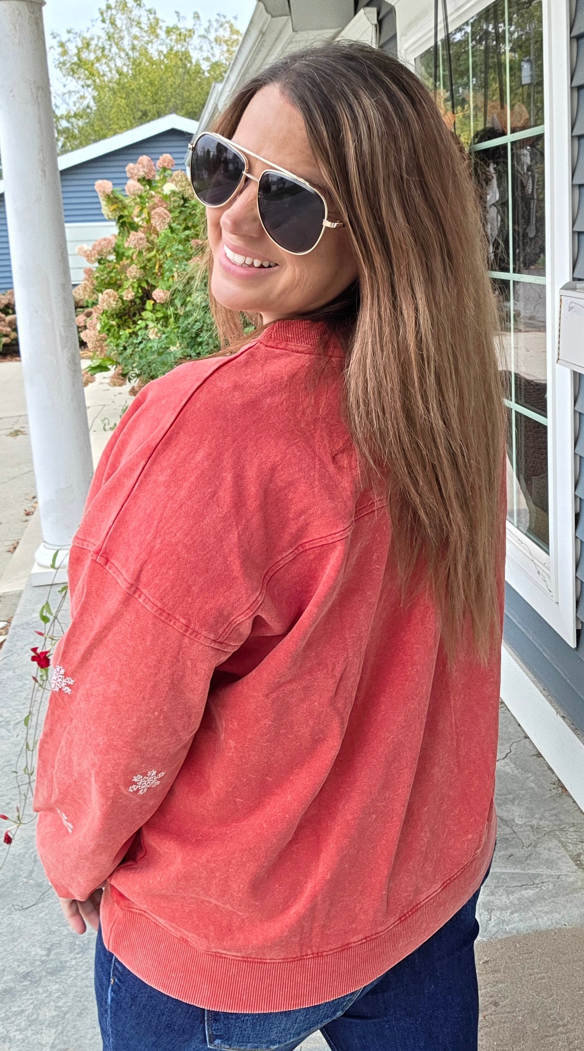 WASHED RED PULLOVER WITH EMBROIDERED SNOWFLAKES