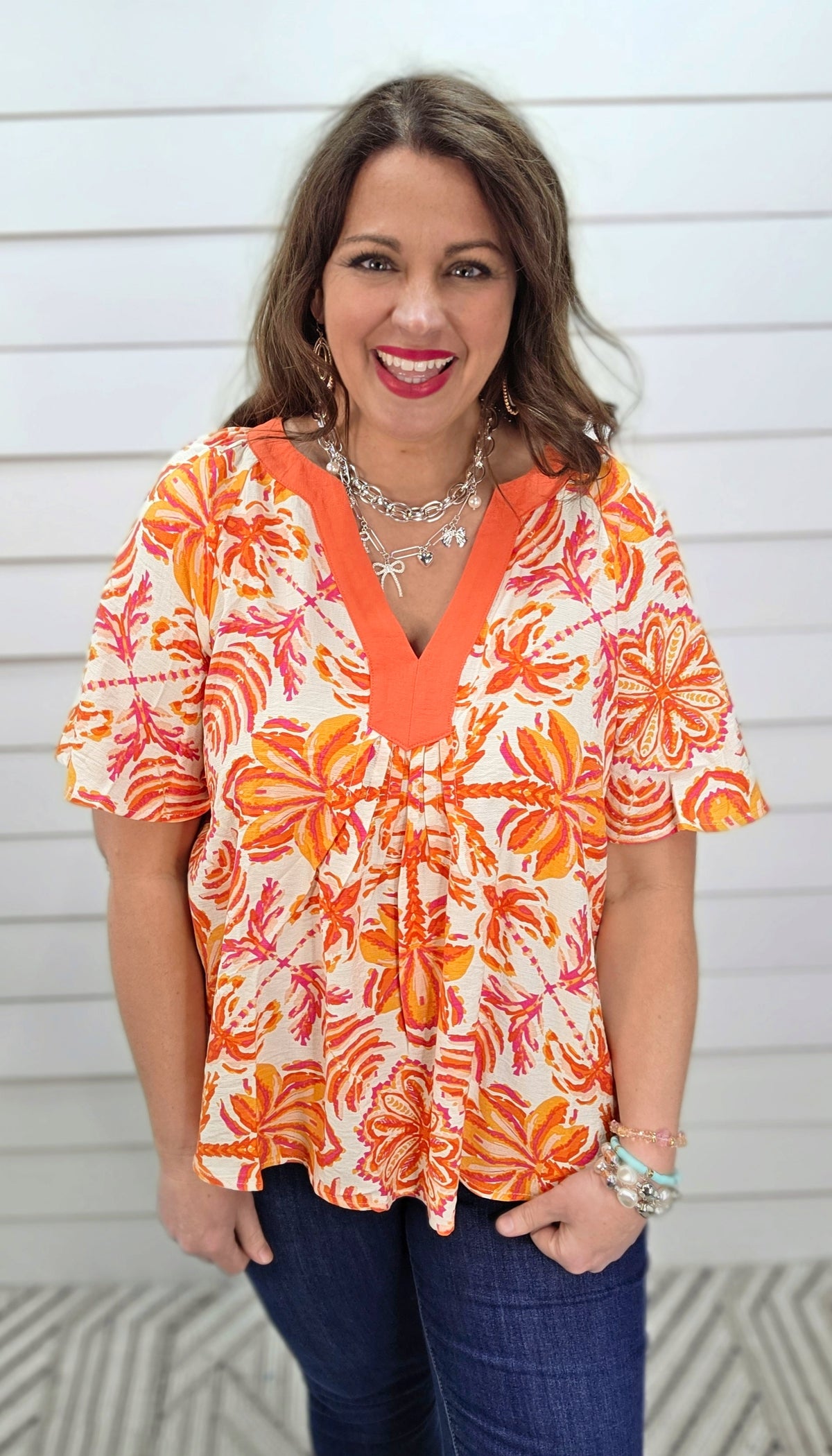 ORANGE FLORAL PRINT TOP W/ Y NECK LINE AND FLUTTER SLEEVE