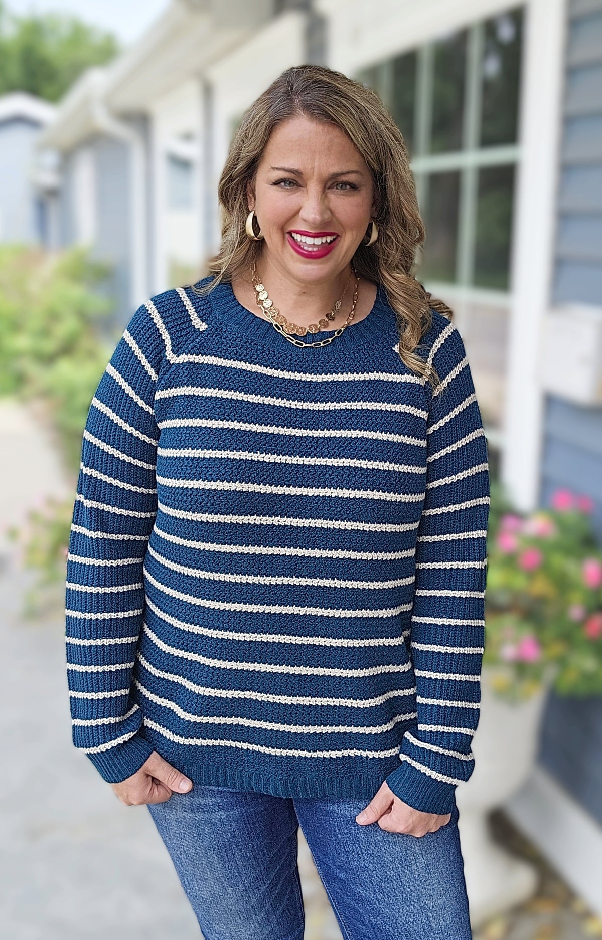 TEAL STRIPED CURVED HEM SWEATER