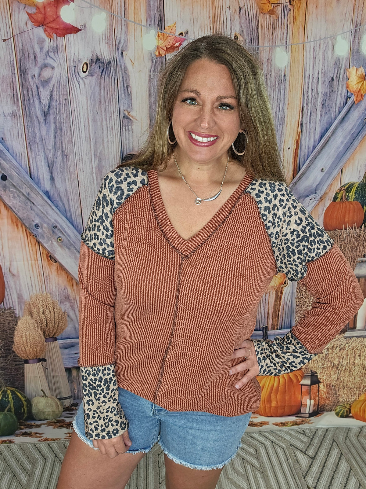 RUST RIBBED TOP W/ ANIMAL PRINT TRIM