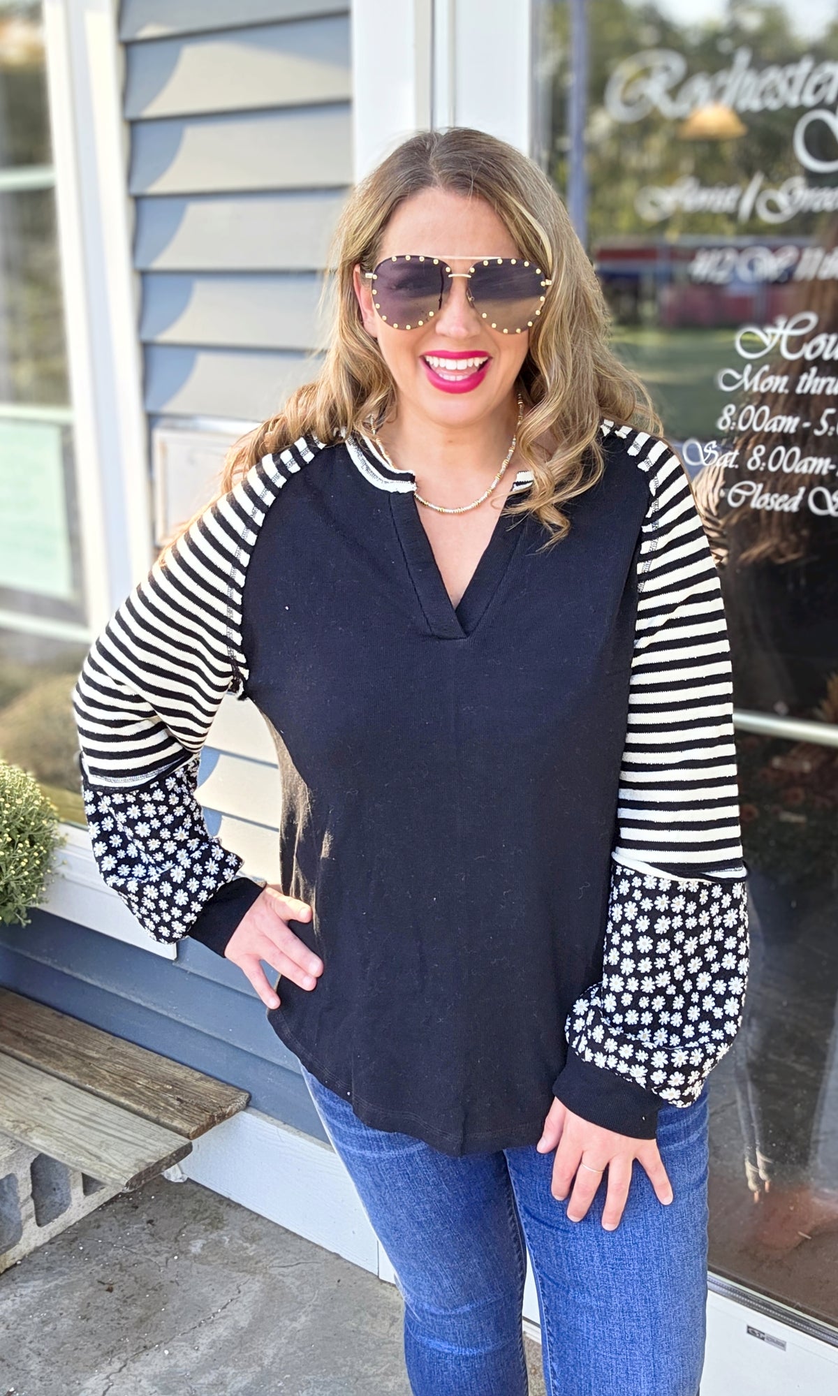 BLACK COTTON TOP W/ CONTRAST STRIPED AND FLORAL SLEEVES