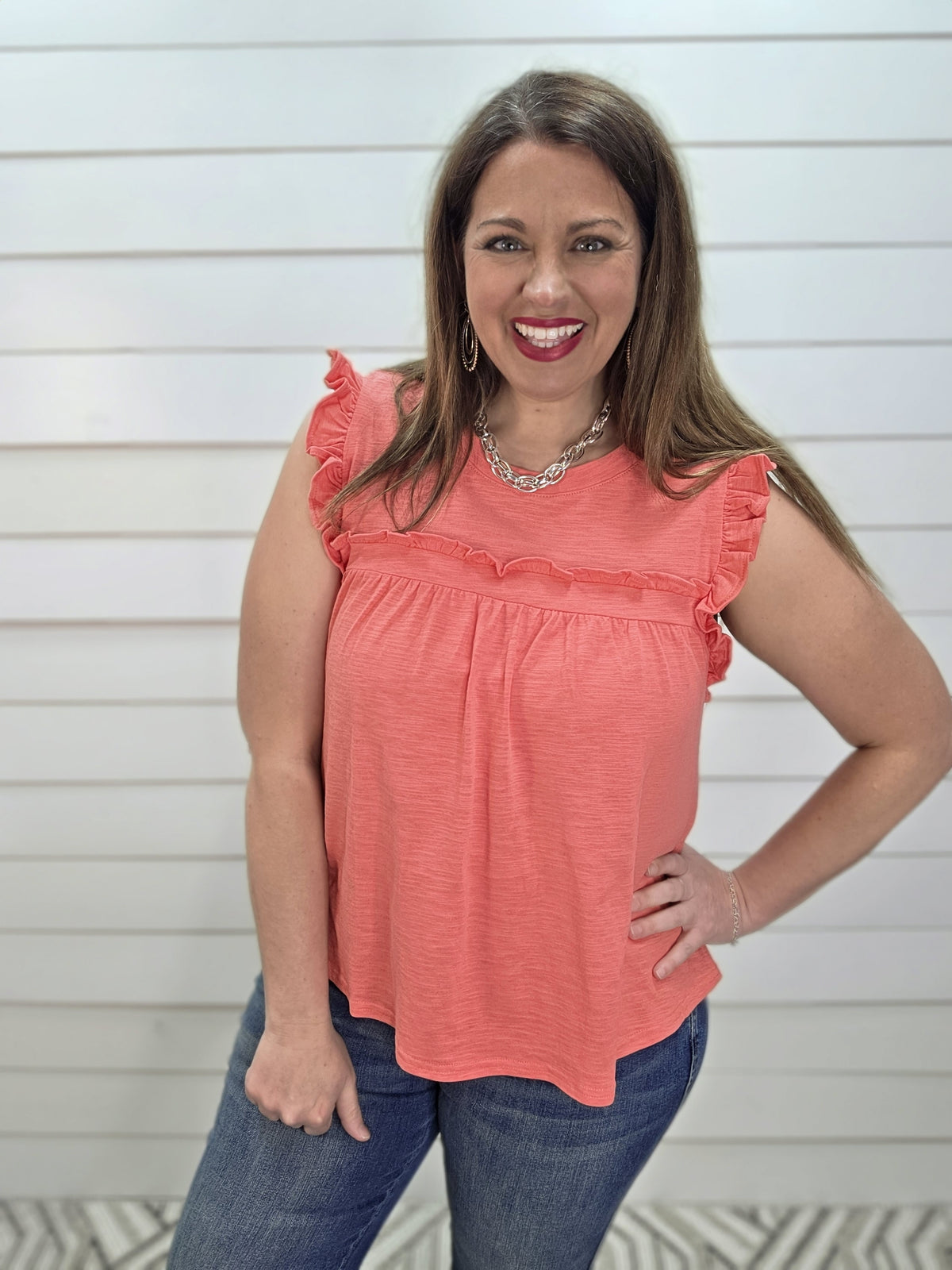CORAL KNIT RUFFLE DETAIL SLEEVELESS TOP