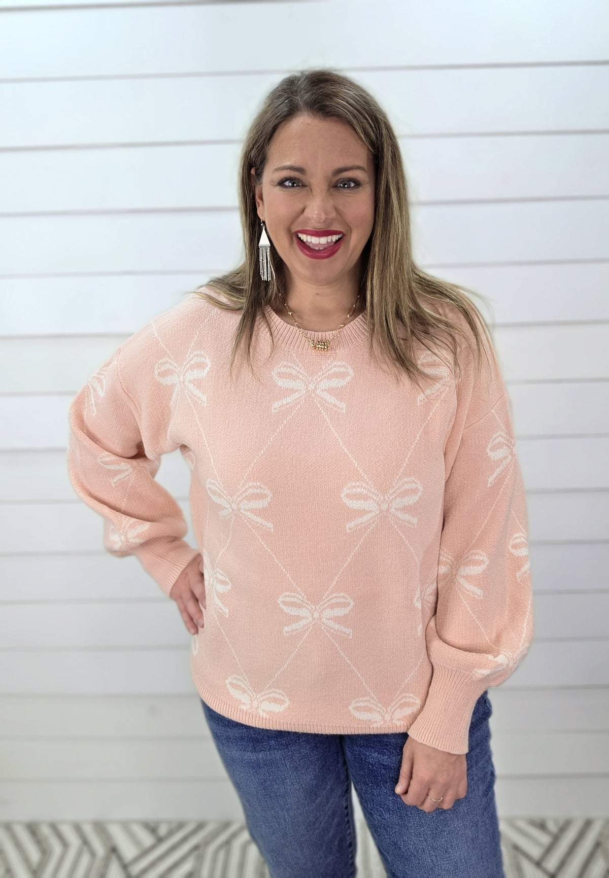 PINK BOW PRINT SWEATER