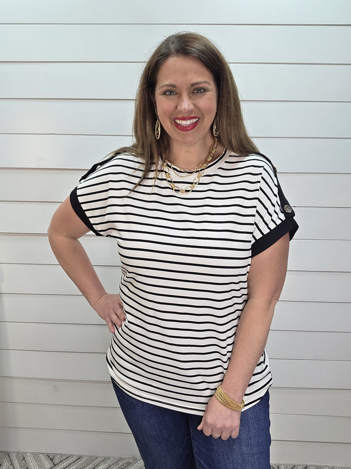 BLACK/WHITE STRIPED KNIT TOP W/ BUTTON SLEEVE DETAILS