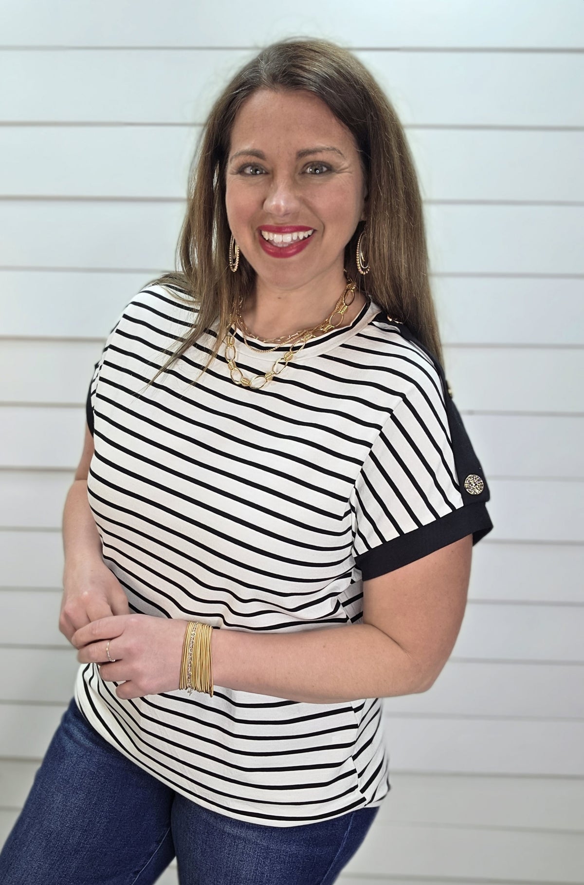 BLACK/WHITE STRIPED KNIT TOP W/ BUTTON SLEEVE DETAILS