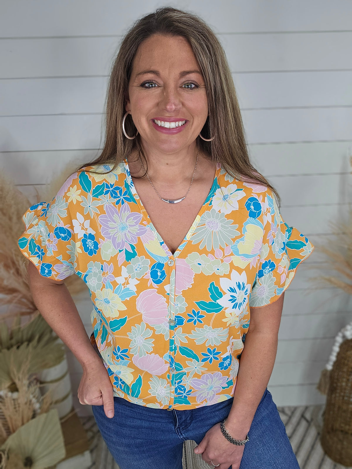 ORANGE FLORAL FAUX BUTTON FRONT V NECK TOP