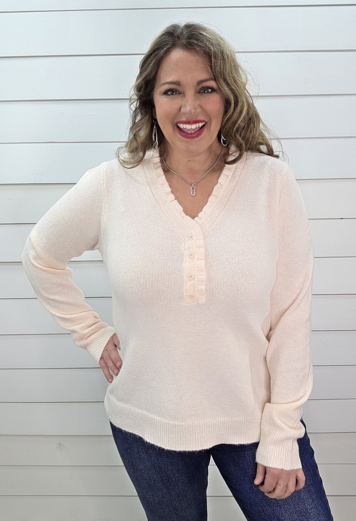 PALE BLUSH RUFFLE HENLEY KNIT SWEATER