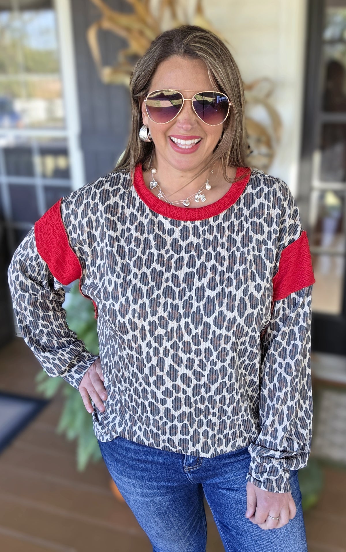 TAUPE ANIMAL PRINT RAISED RIBBED TOP WITH RED TRIM
