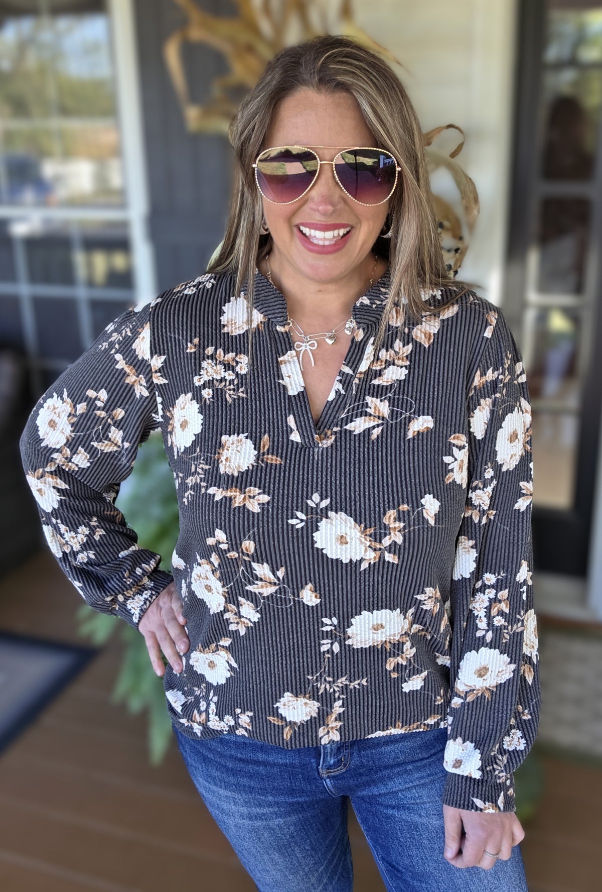 BLACK RAISED RIBBED FLORAL V NECK TOP