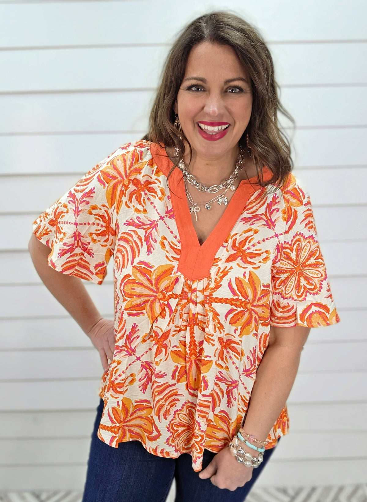 ORANGE FLORAL PRINT TOP W/ Y NECK LINE AND FLUTTER SLEEVE