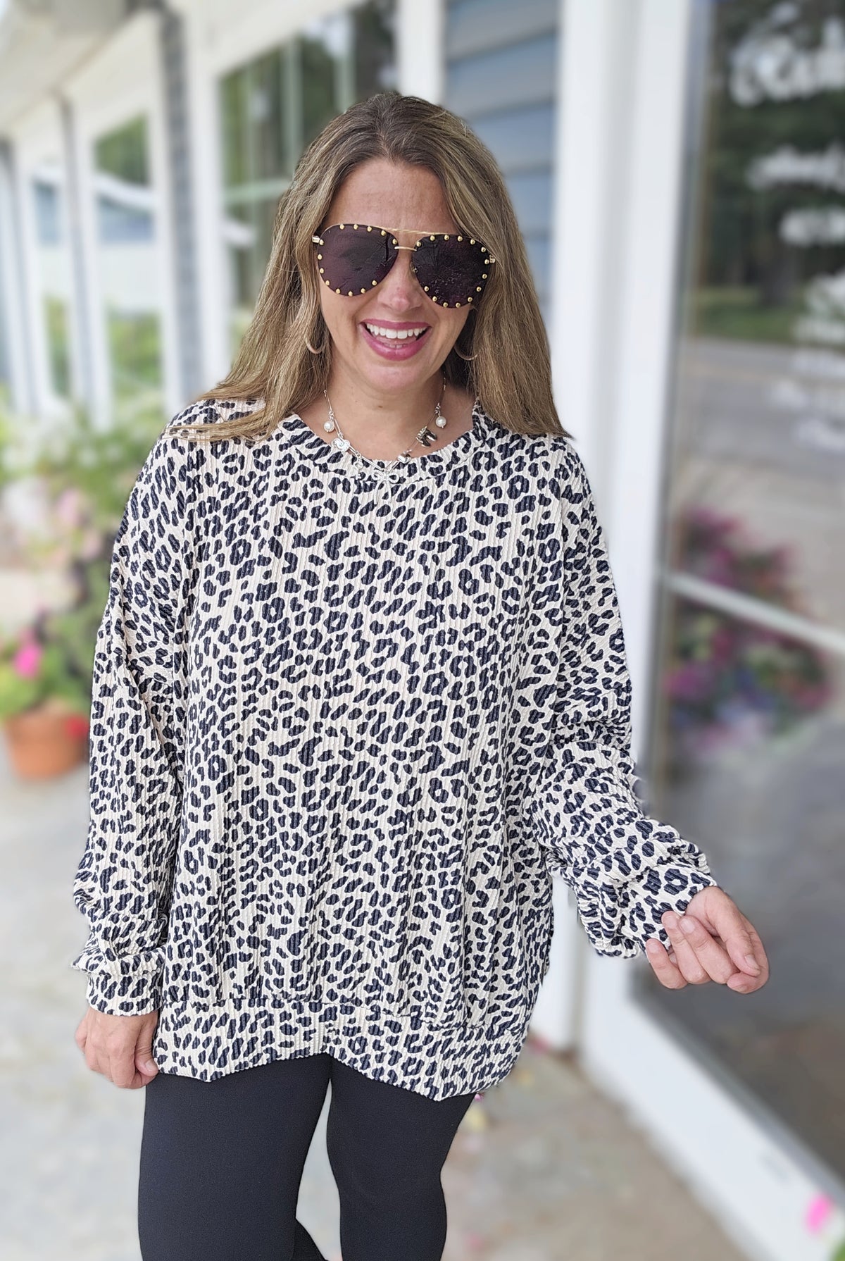 CREAM ANIMAL RAISED RIBBED SLIT BOTTOM LONG SLEEVE TOP