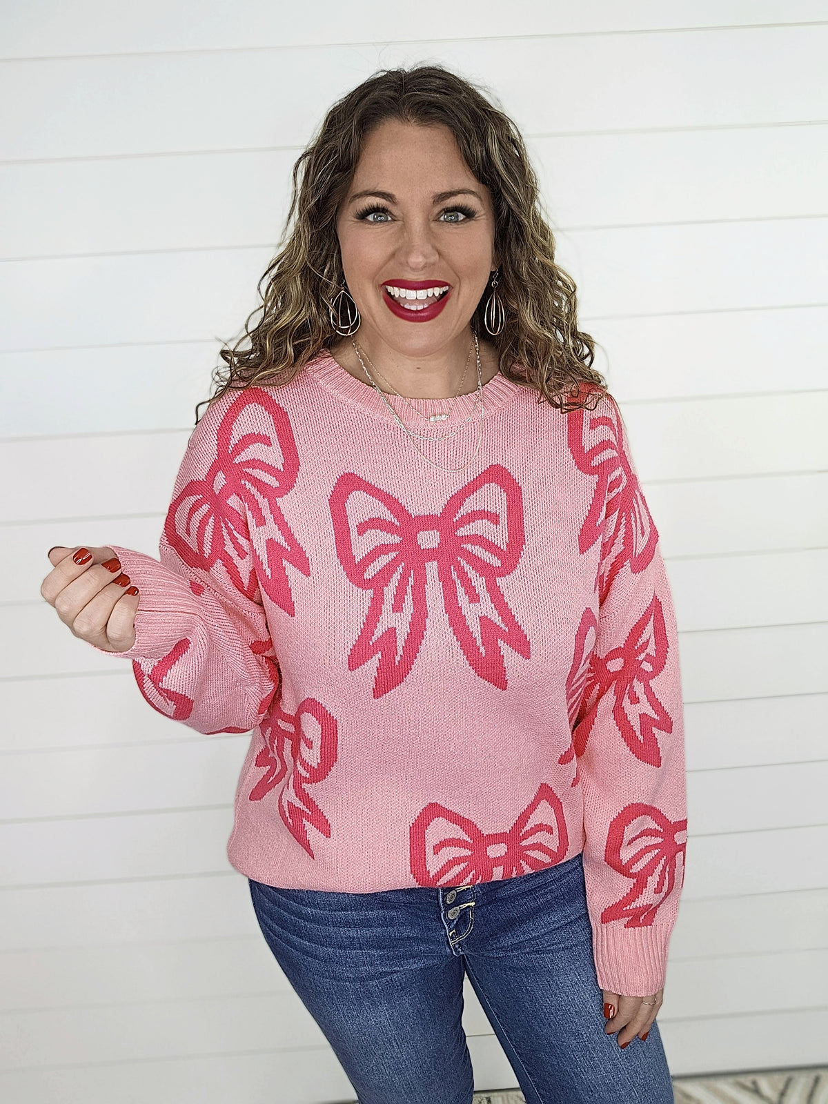 PINK OVERSIZED BOW SWEATER