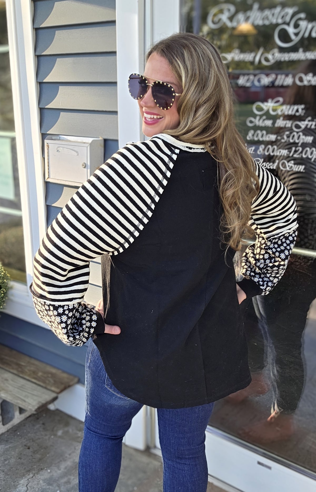 BLACK COTTON TOP W/ CONTRAST STRIPED AND FLORAL SLEEVES