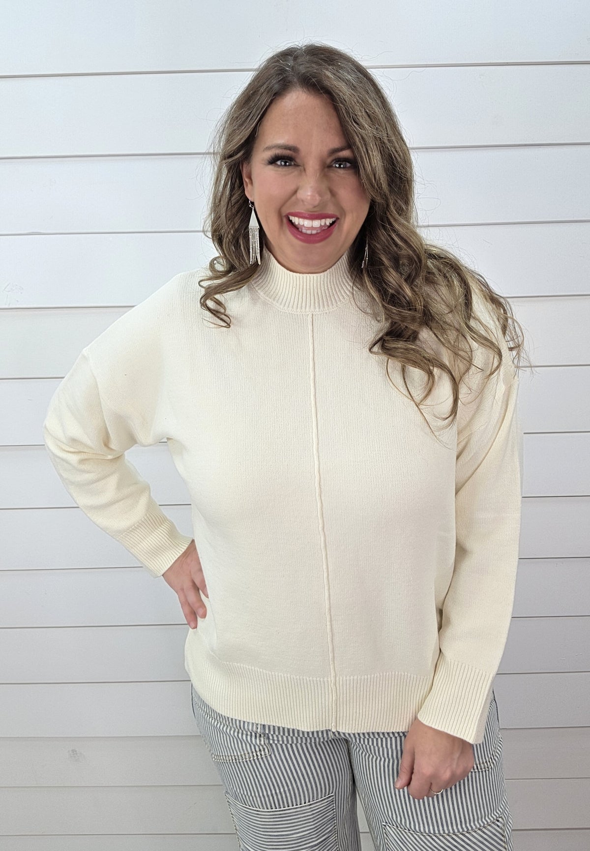 CREAM CENTER SEAM MOCK NECK SWEATER