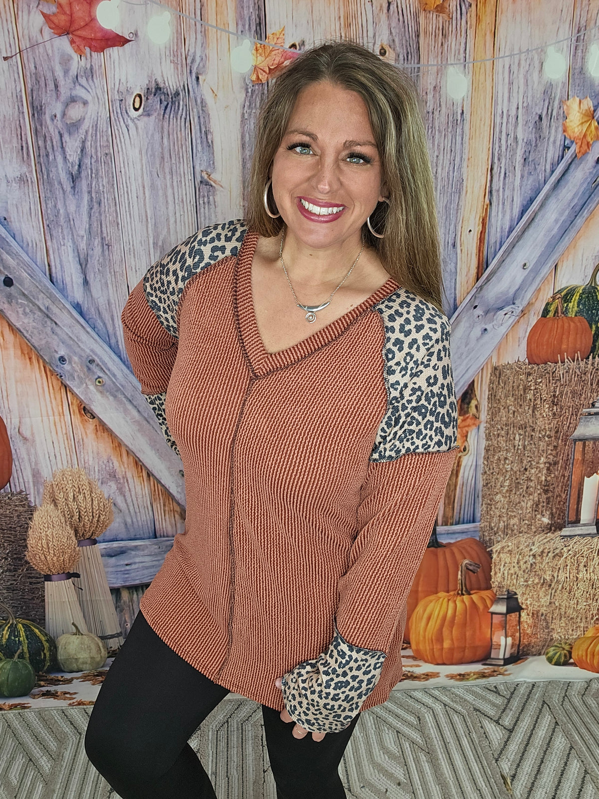 RUST RIBBED TOP W/ ANIMAL PRINT TRIM