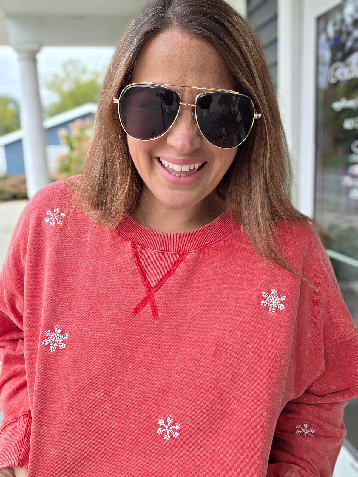 WASHED RED PULLOVER WITH EMBROIDERED SNOWFLAKES