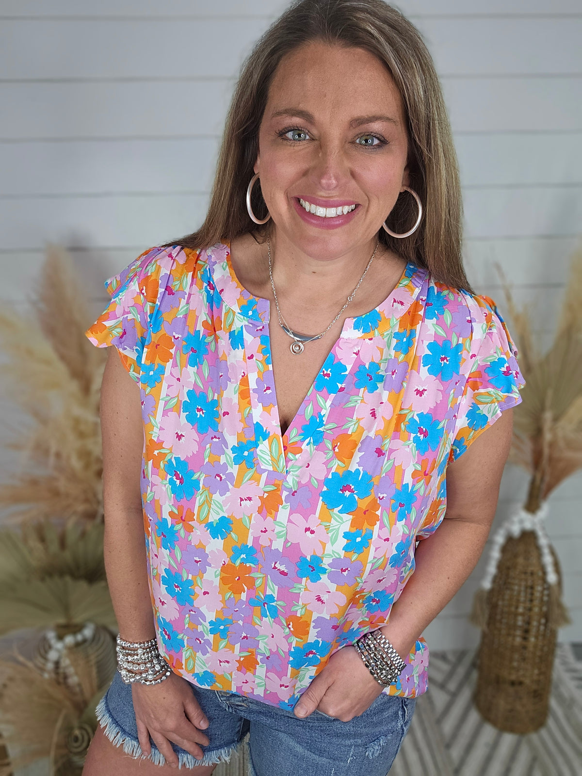 MULTI COLOR FLORAL V NECK WOVEN TOP W/ RUFFLE SLEEVE