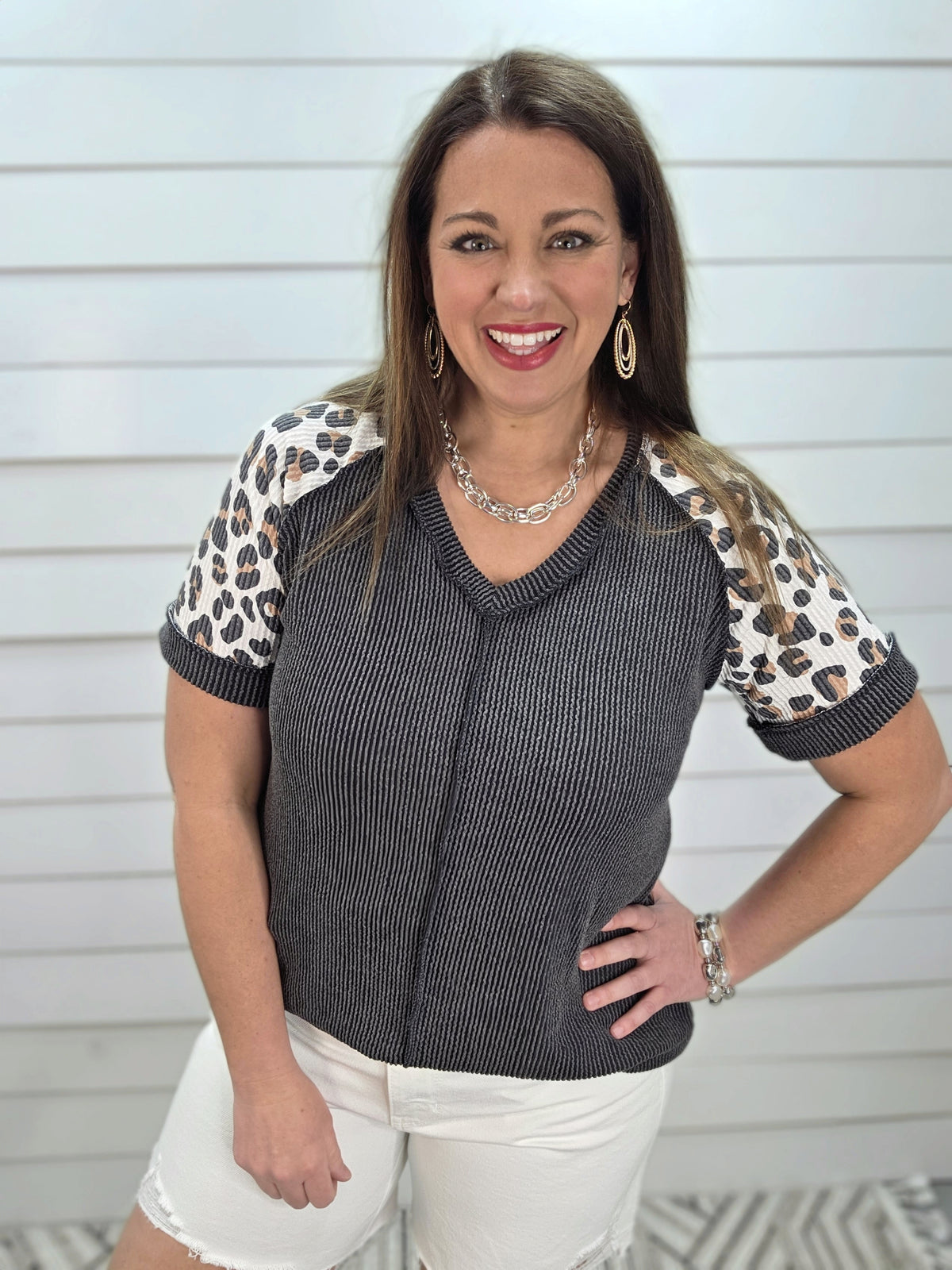 BLACK RAISED RIBBED KNIT TOP W/ LEOPARD SLEEVES AND CENTER SEAM