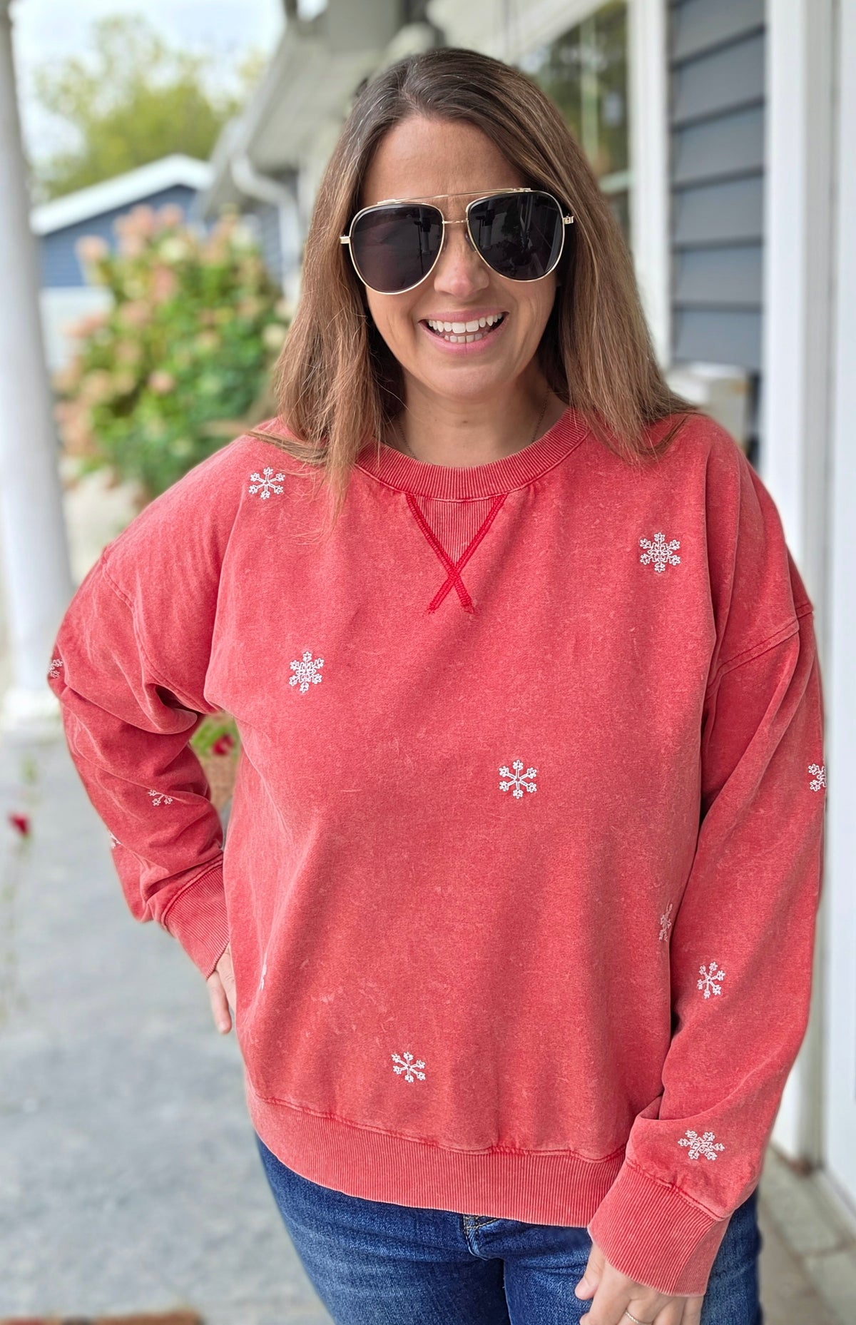 WASHED RED PULLOVER WITH EMBROIDERED SNOWFLAKES