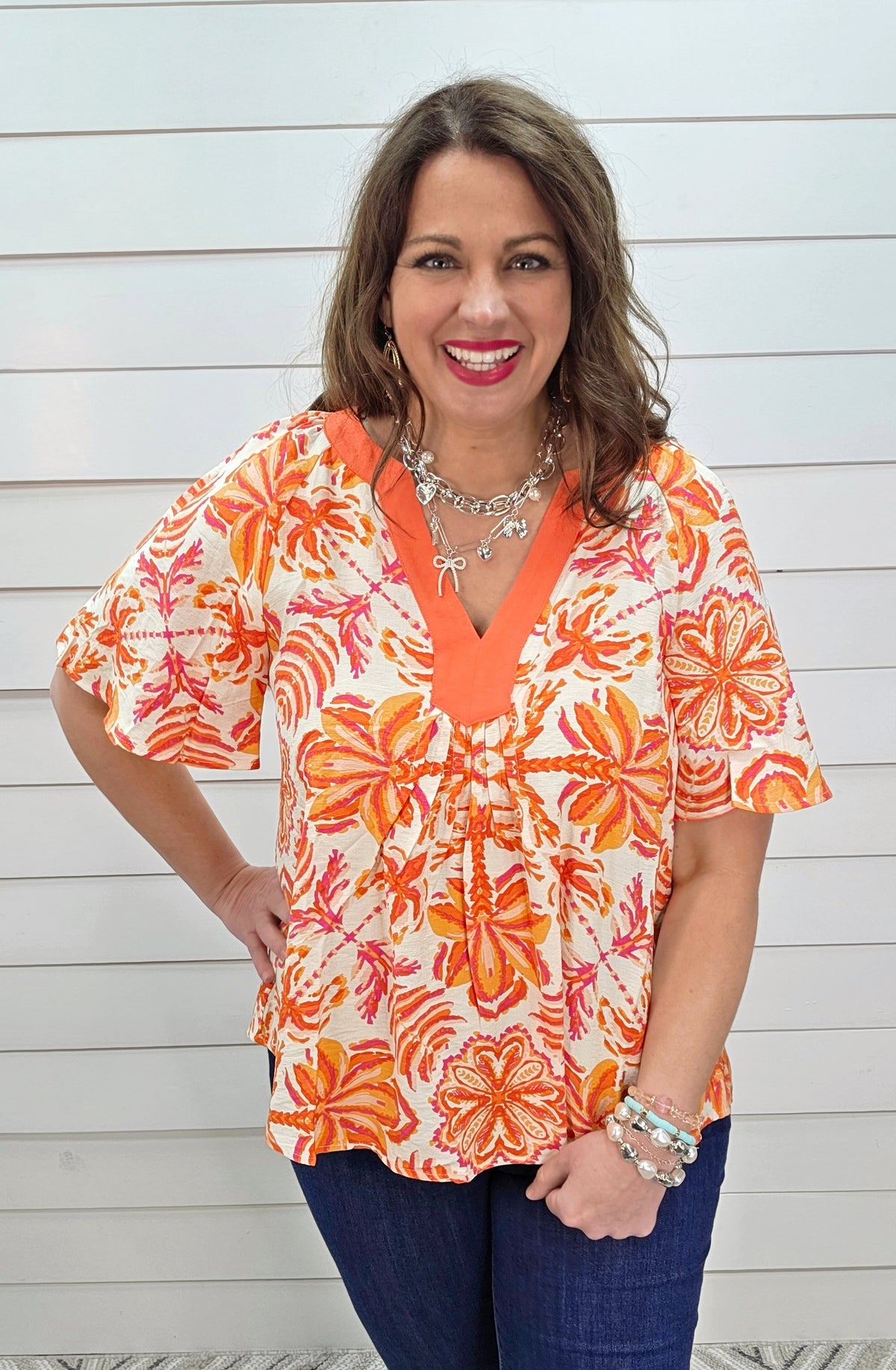 ORANGE FLORAL PRINT TOP W/ Y NECK LINE AND FLUTTER SLEEVE
