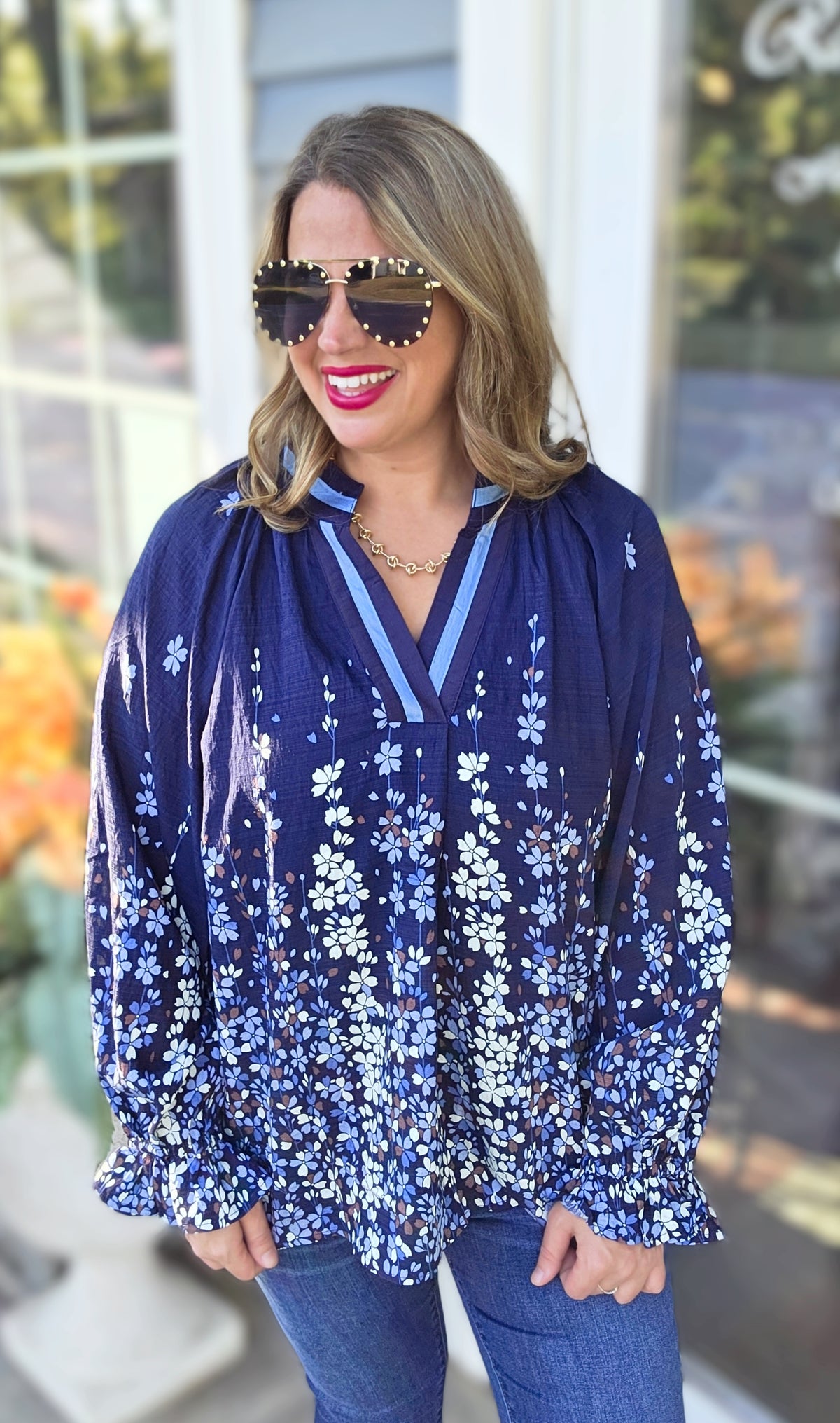 NAVY FLORAL V NECK WOVEN TOP